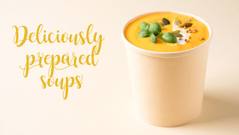 pumpkin soup in a take-out container